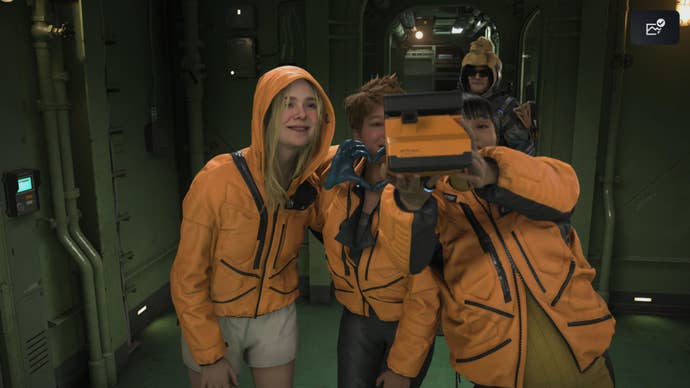 Death Stranding 2 screenshot showing three characters in orange suits taking a selfie with Sam in the background