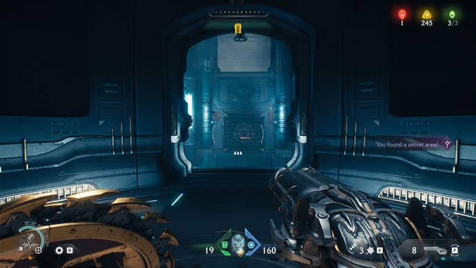 The player - standing in a secret area - looks towards a vent with a purple shield sigil on it in DOOM: The Dark Ages' Sentinel Command Station chapter