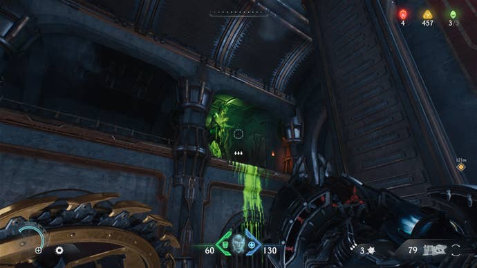 The player looks up at a green corpse they can Shield Throw at in the Sentinel Barracks chapter in DOOM: The Dark Ages