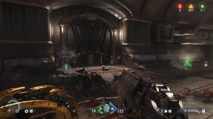 The player looks at a door with an interactive panel beside in the Sentinel Barracks chapter in DOOM: The Dark Ages