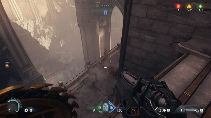 The player looks at a platform beneath a bridge that they can jump down to in The Holy City of Aratum in DOOM: The Dark Ages
