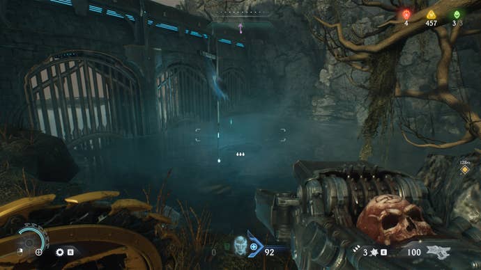 The player looks toward a blue flag that is beside an underwater opening in The Siege Part 1 chapter of DOOM: The Dark Ages