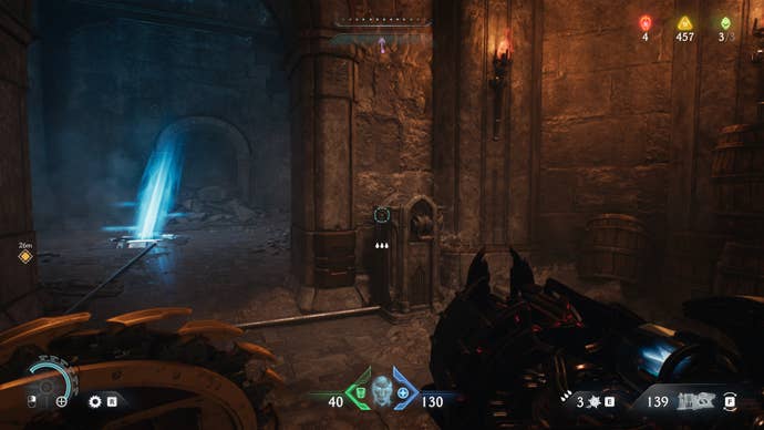 The player looks at a terminal that can be interacted with to activate the gravity jet to the left of it in The Siege Part 1 chapter of DOOM: The Dark Ages