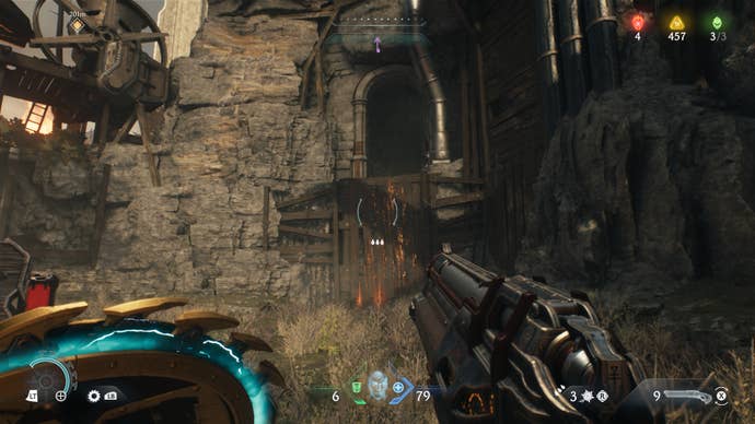 The player looks towards a climbable plank of wood that leads to a cave in The Siege Part 1 chapter of DOOM: The Dark Ages