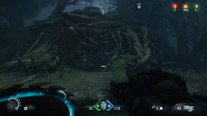 The player aims at some tree roots that have a purple shield sigil on them in DOOM: The Dark Ages' Abyssal Forest