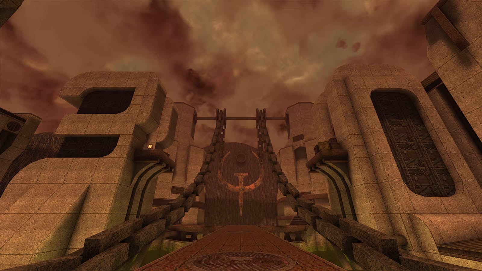 A bridge leading to a Quake "Q" logo.