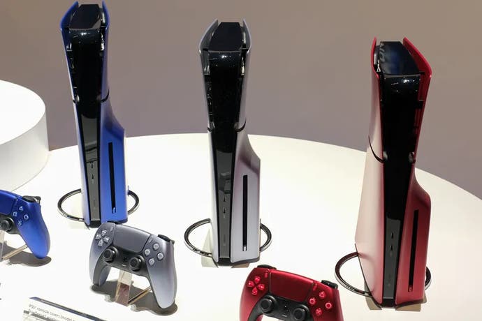 Front view of the PS5 'slim' consoles with red, silver and blue faceplates