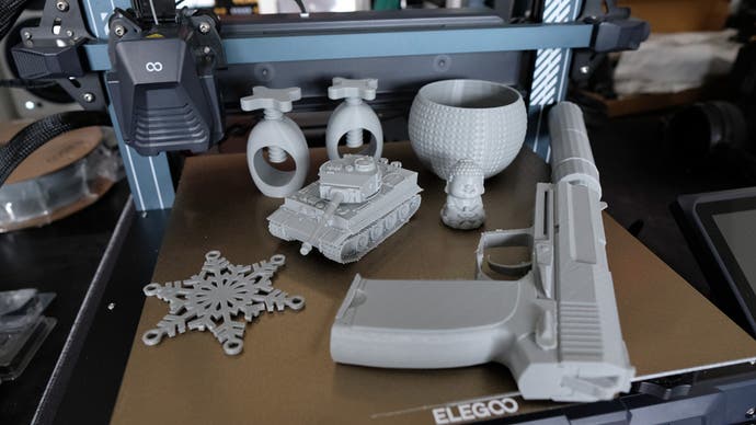 elegoo Neptune 4 3D printed models including Tiger Tank, USP-S, Bowl, Nutcracker, Stars and more