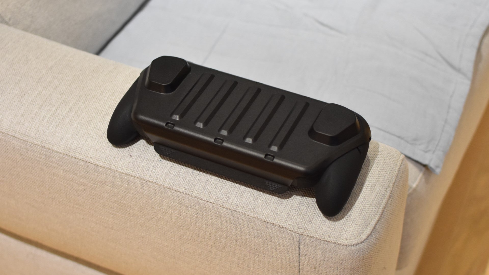 An Asus ROG Xbox Ally X inside a Dbrand Project Killswitch case.