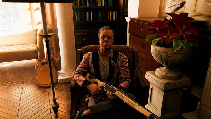 Dead Island 2 screenshot of Curtis Sinclair sat in an armchair.