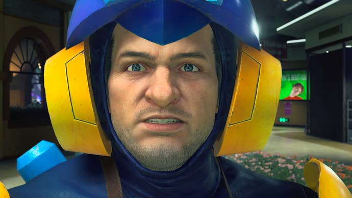 Frank, dressed as Mega Man, looks shocked in a cutscene from Dead Rising Deluxe Remaster.