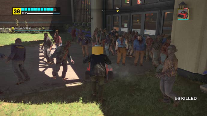 Frank West mows down zombie crowds with a literal lawnmower in a screenshot from Dead Rising Deluxe Remaster.