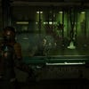 A Lurker necromorph kills an unfortunate scientist in the Dead Space remake.