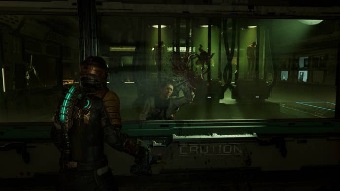 A Lurker necromorph kills an unfortunate scientist in the Dead Space remake.