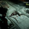 A dead Slasher necromorph lies on the ground in the Dead Space remake.