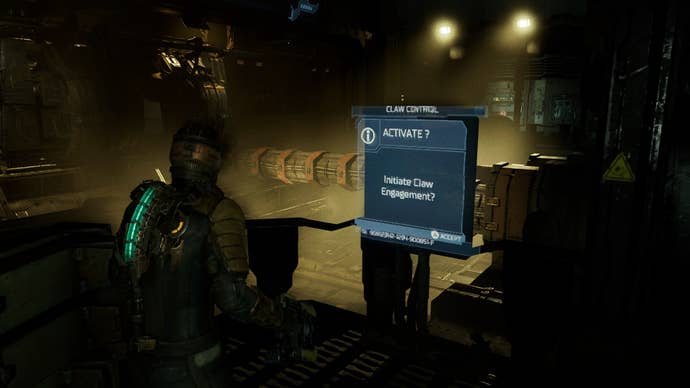 Isaac engages two claws in the Tram Control Room in Dead Space