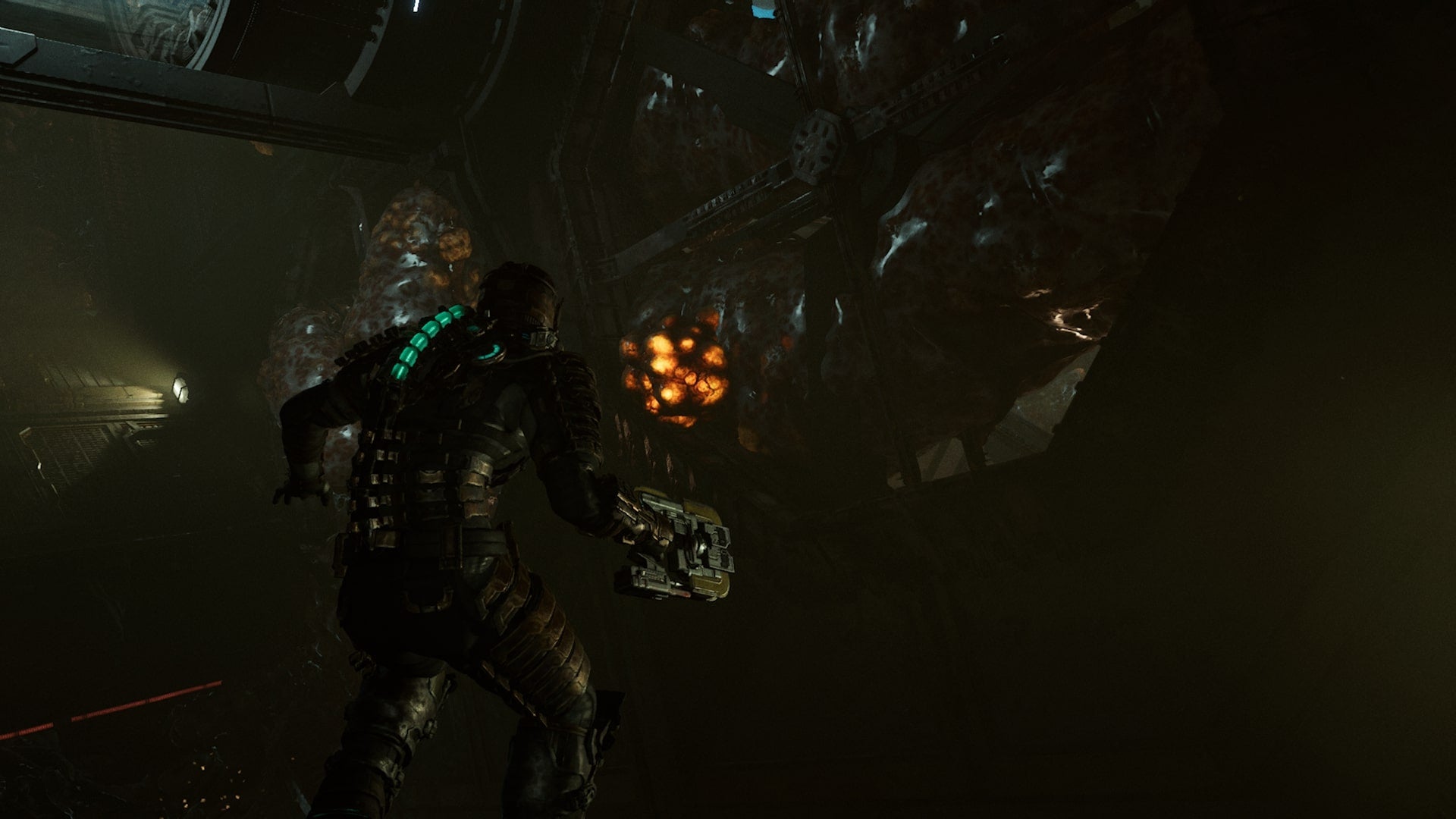 Isaac aims at a tendril in Dead Space