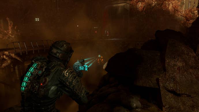 Isaac aims at a tendril in Dead Space