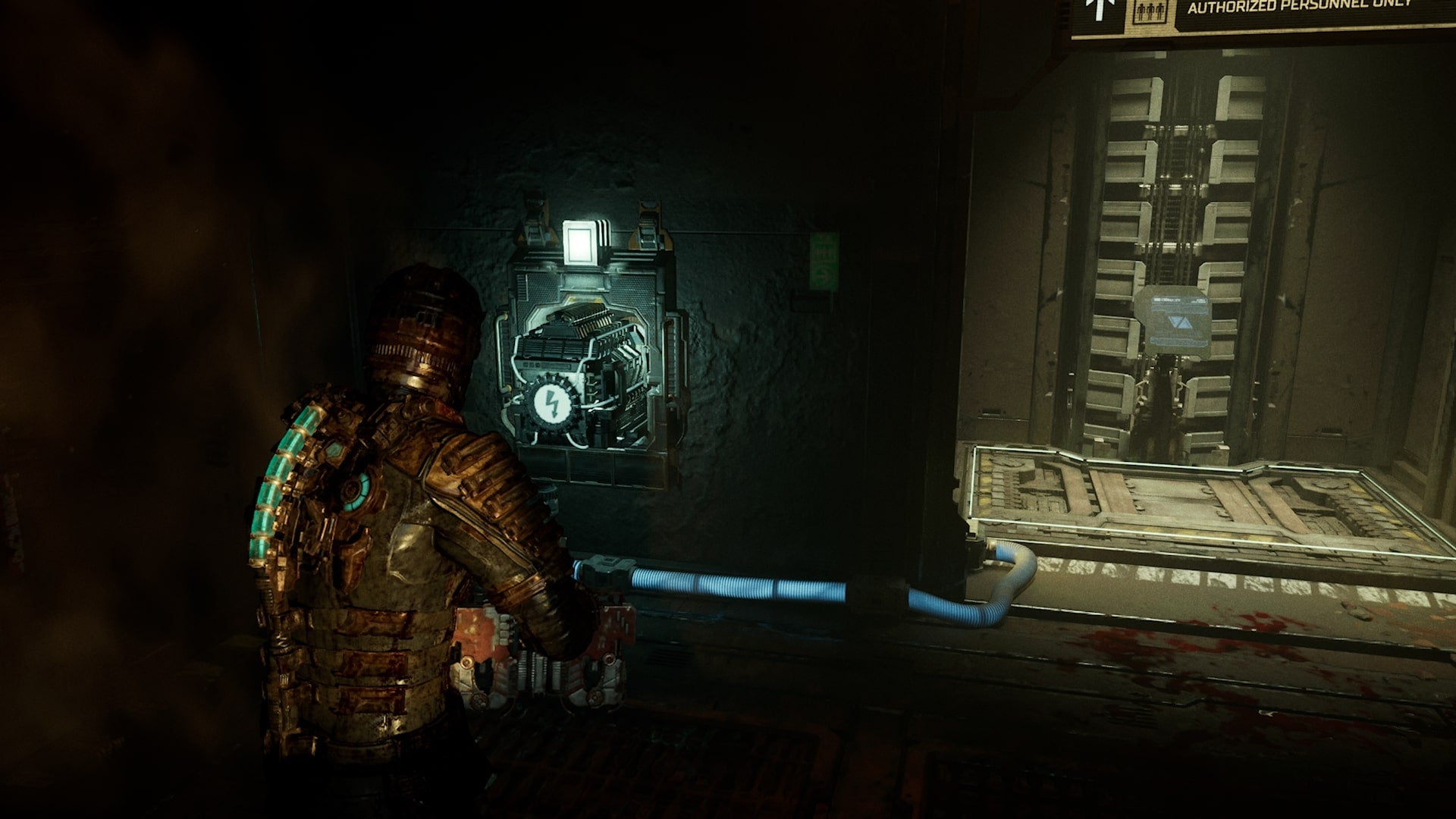 Isaac uses the power cell to power an elevator in Dead Space - 10
