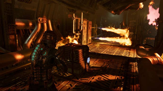 Isaac uses Kinesis on a crate to navigate a fire trap in Dead Space