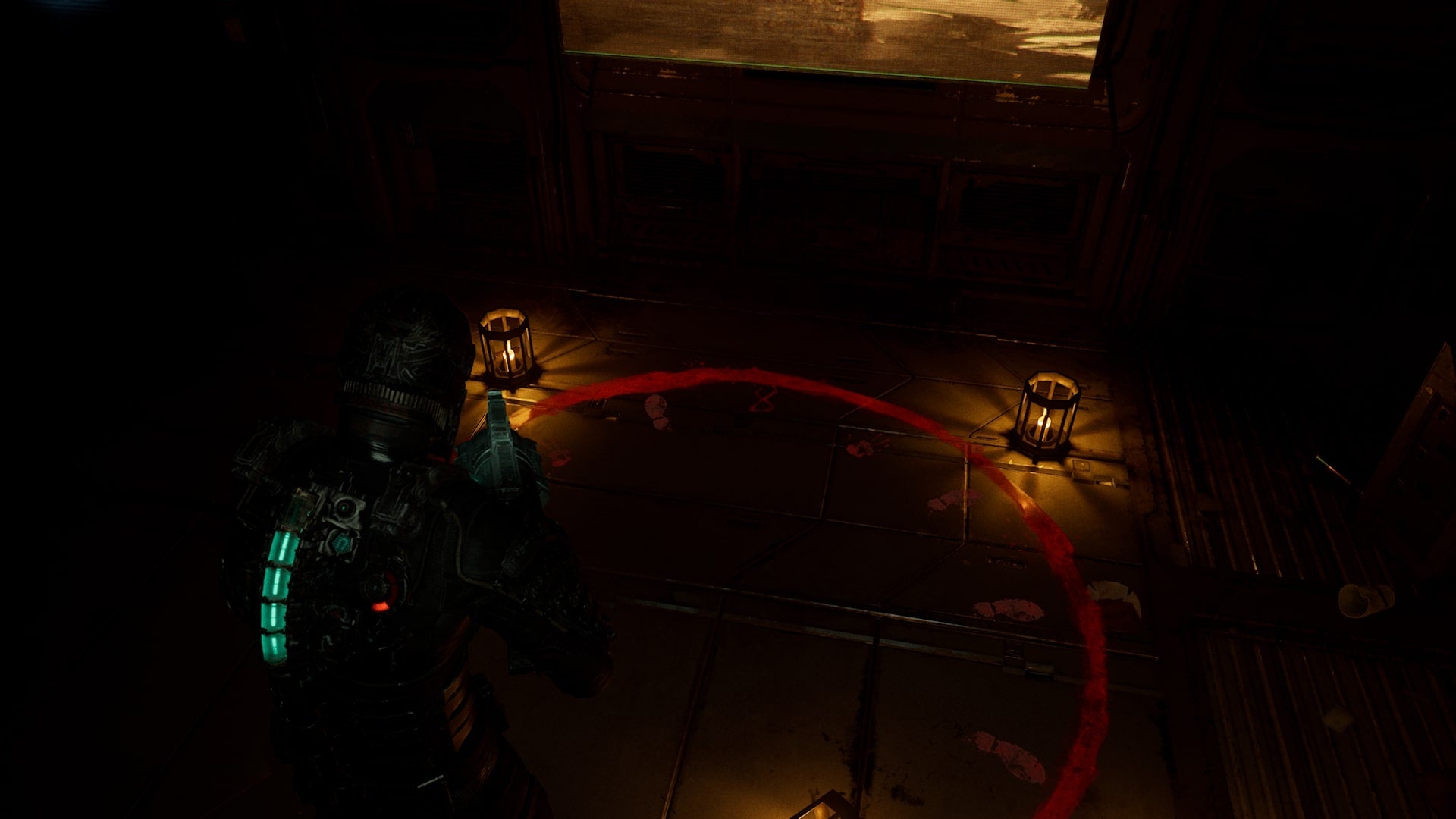 Isaac looks down at the ritual circle in the Break Room in Dead Space - 4
