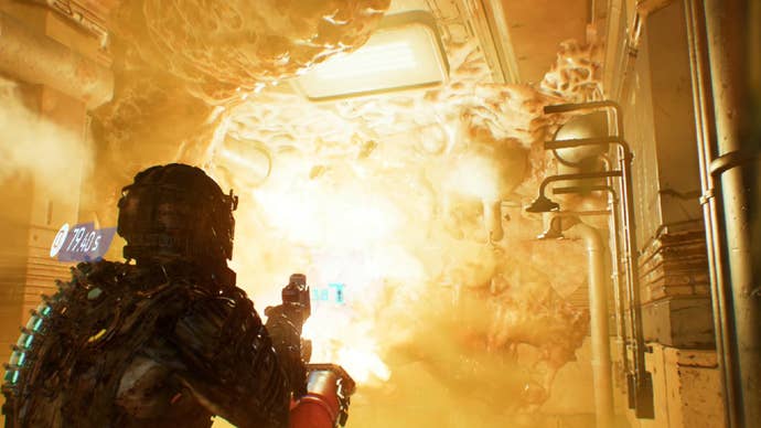 Dead Space image showing Isaac firing at a yellow tendril weak point with a flamethrower.