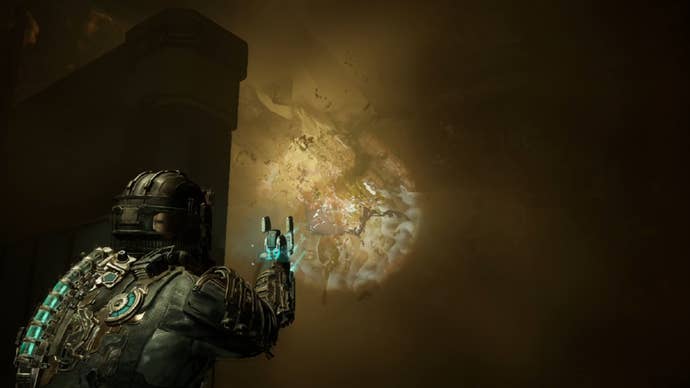 Dead Space image showing Isaac aiming at a weak point of a Necromorph tendril.