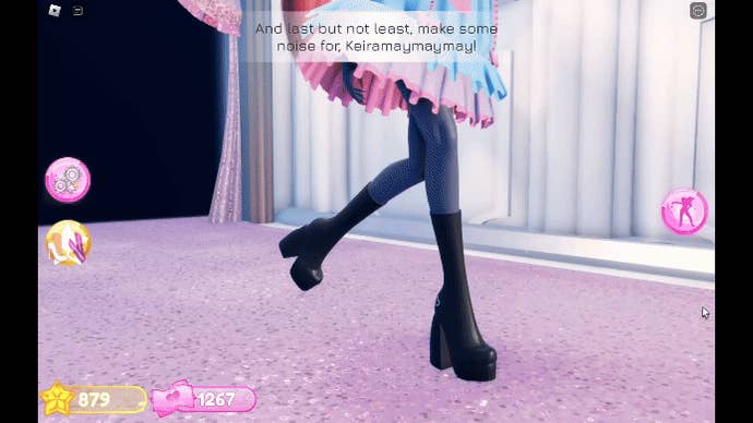 A player performs a death drop on the Dress to Impress runway. The game’s animations mean that she slides across the floor in an unnatural manner. The female character is unfinished and resembles a mannequin, with blue skin and no facial features.