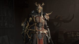 Diablo 4 image showing a Necromancer wearing armor adorned with skulls, and with a Goat Skull helmet on.