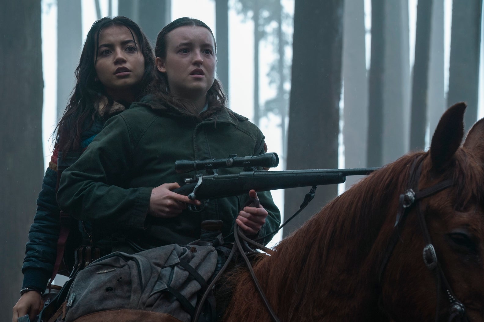 Dina and Ellie on the back of a horse in The Last of Us season two