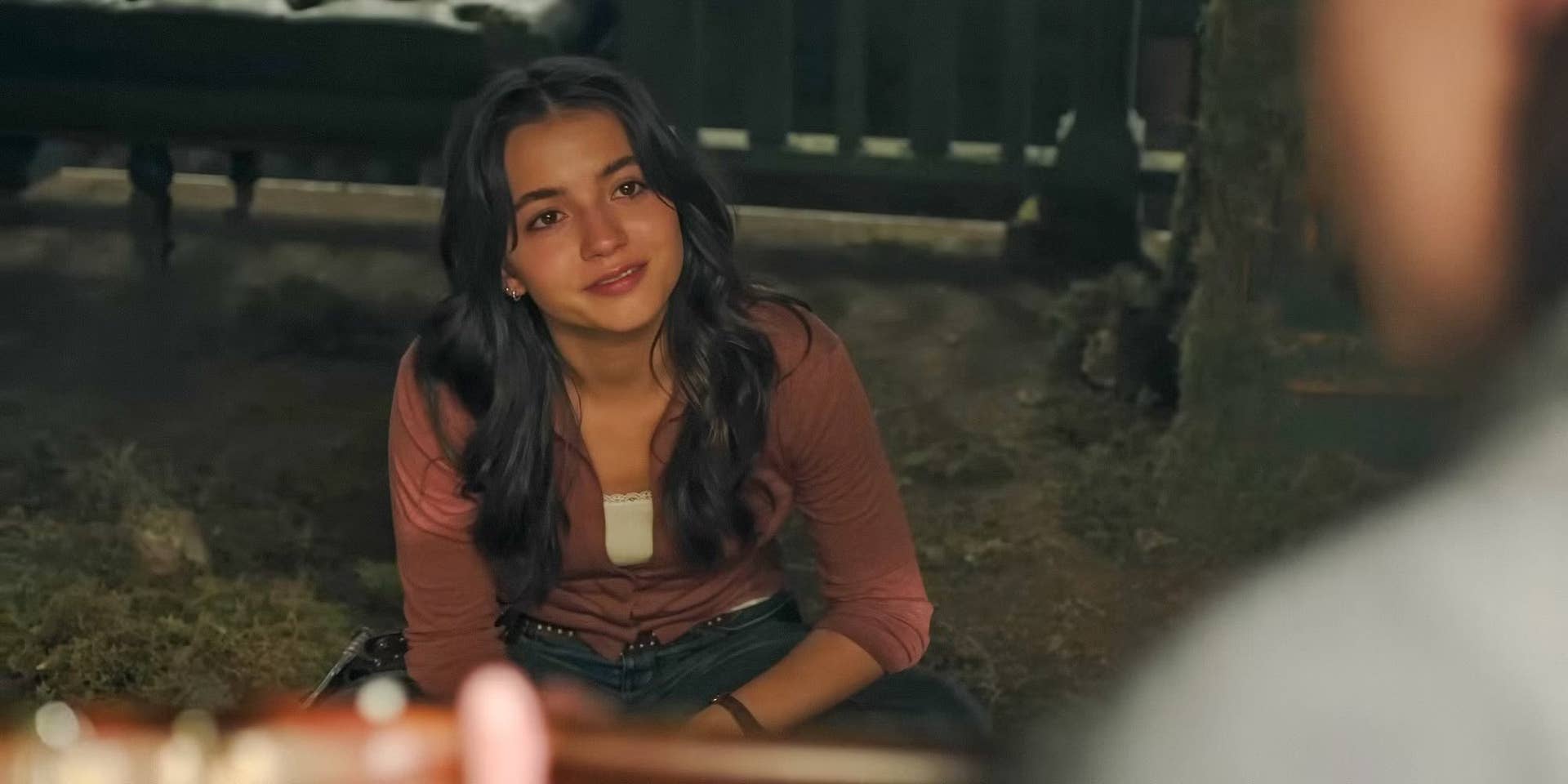 Dina listens to Ellie playing the guitar in The Last of Us season two