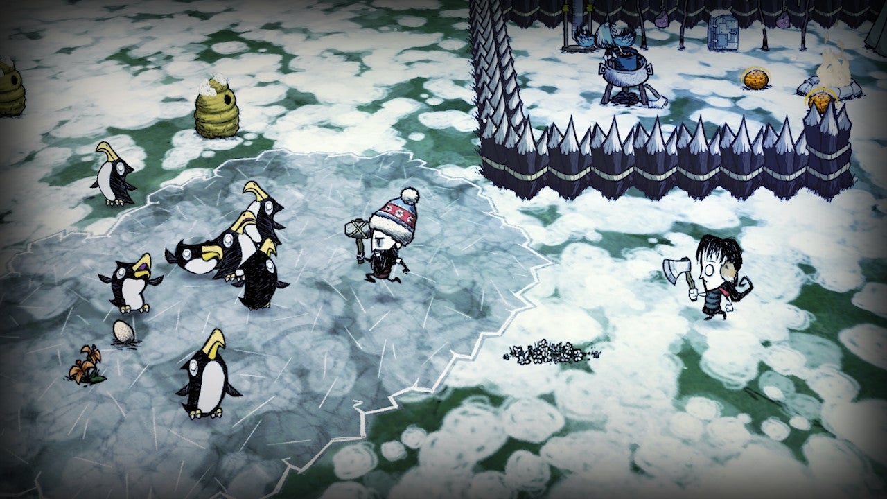 Two players run towards a group of penguins in Don&rsquo;t Starve Together.