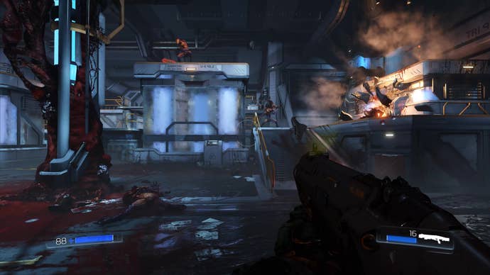 Imps jump around a battle chamber in Doom 2016