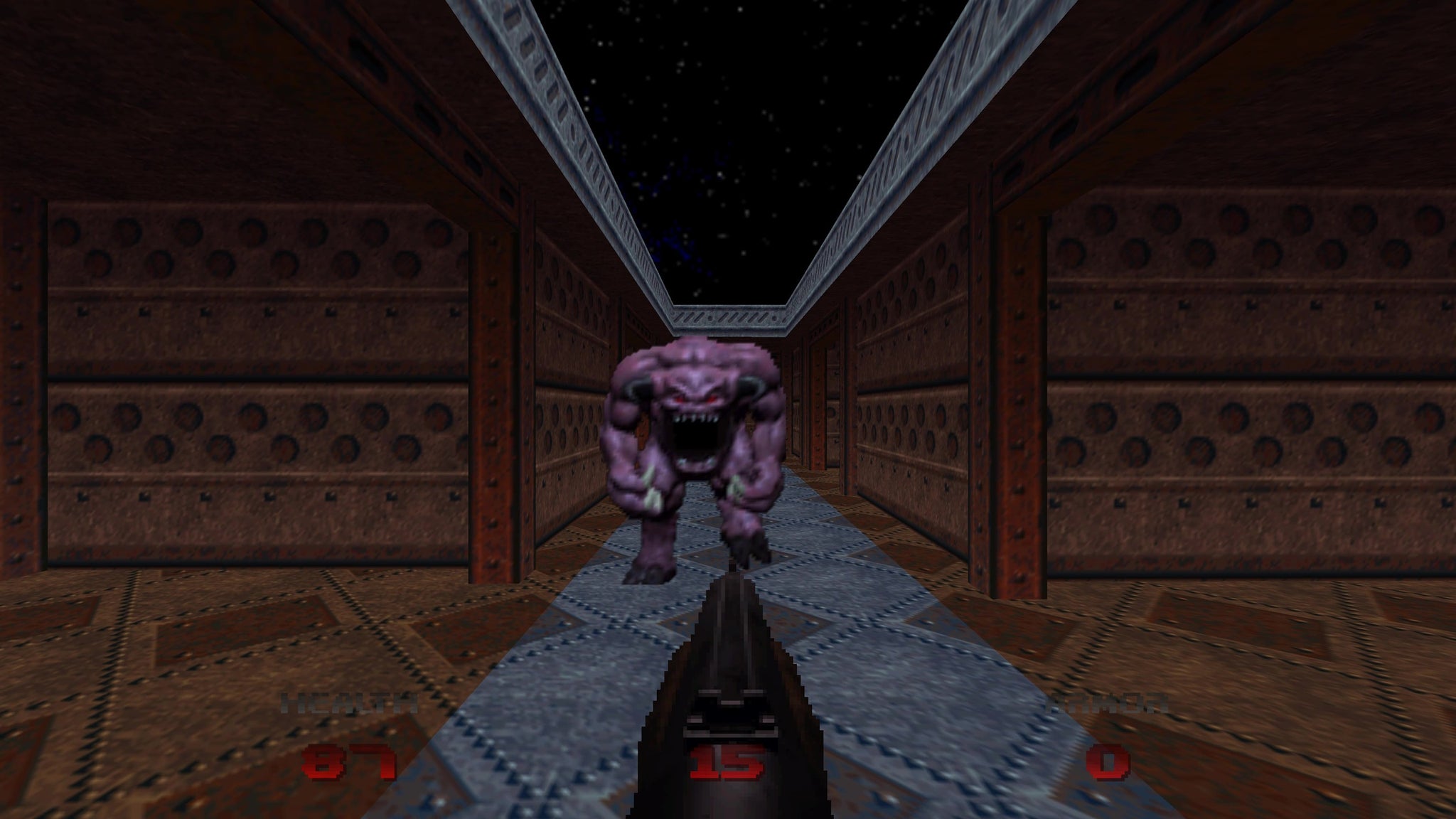 A pinky comes at you down a corridor in Doom 64 - 3