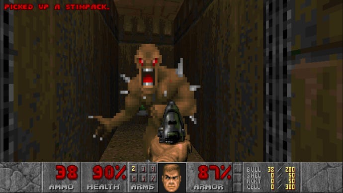 An imp appears behind a locked door in Doom II