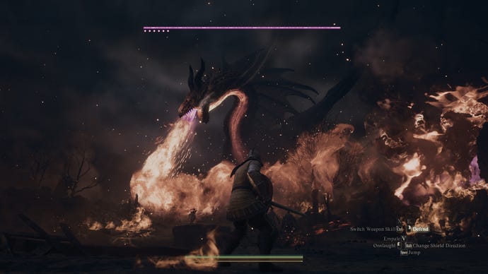 A dragon lays waste to a village in Dragon's Dogma 2.