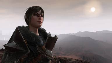 Hawke stands determined in front of a foggy fantasy vista in this screen from Dragon Age 2.
