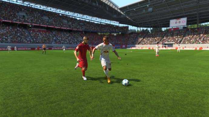 Xavi Simons shielding the ball from Konrad Laimer in EA Sports FC 25.