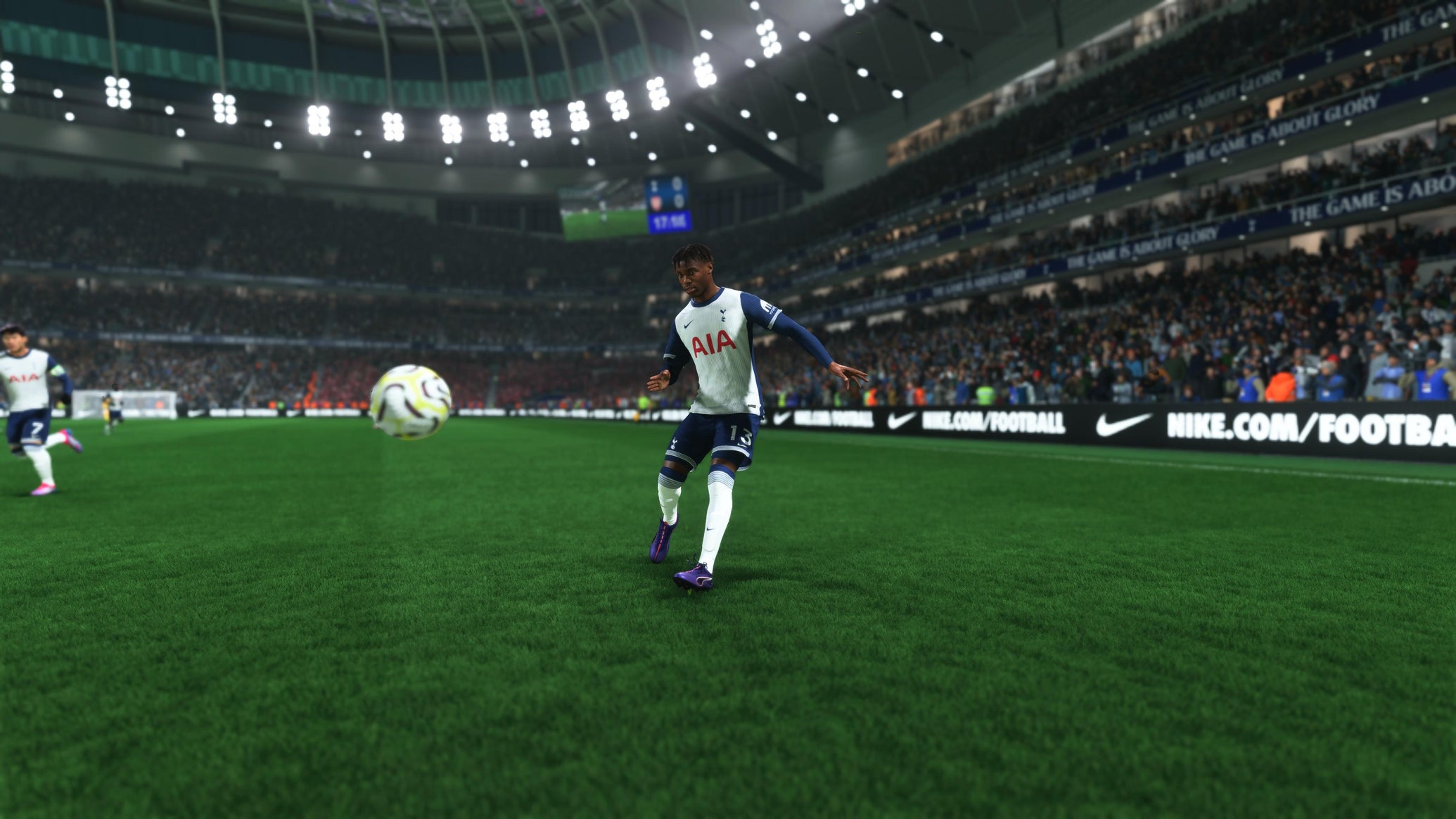 Destiny Udogie crossing the ball for Spurs in EA Sports FC 25. - 1