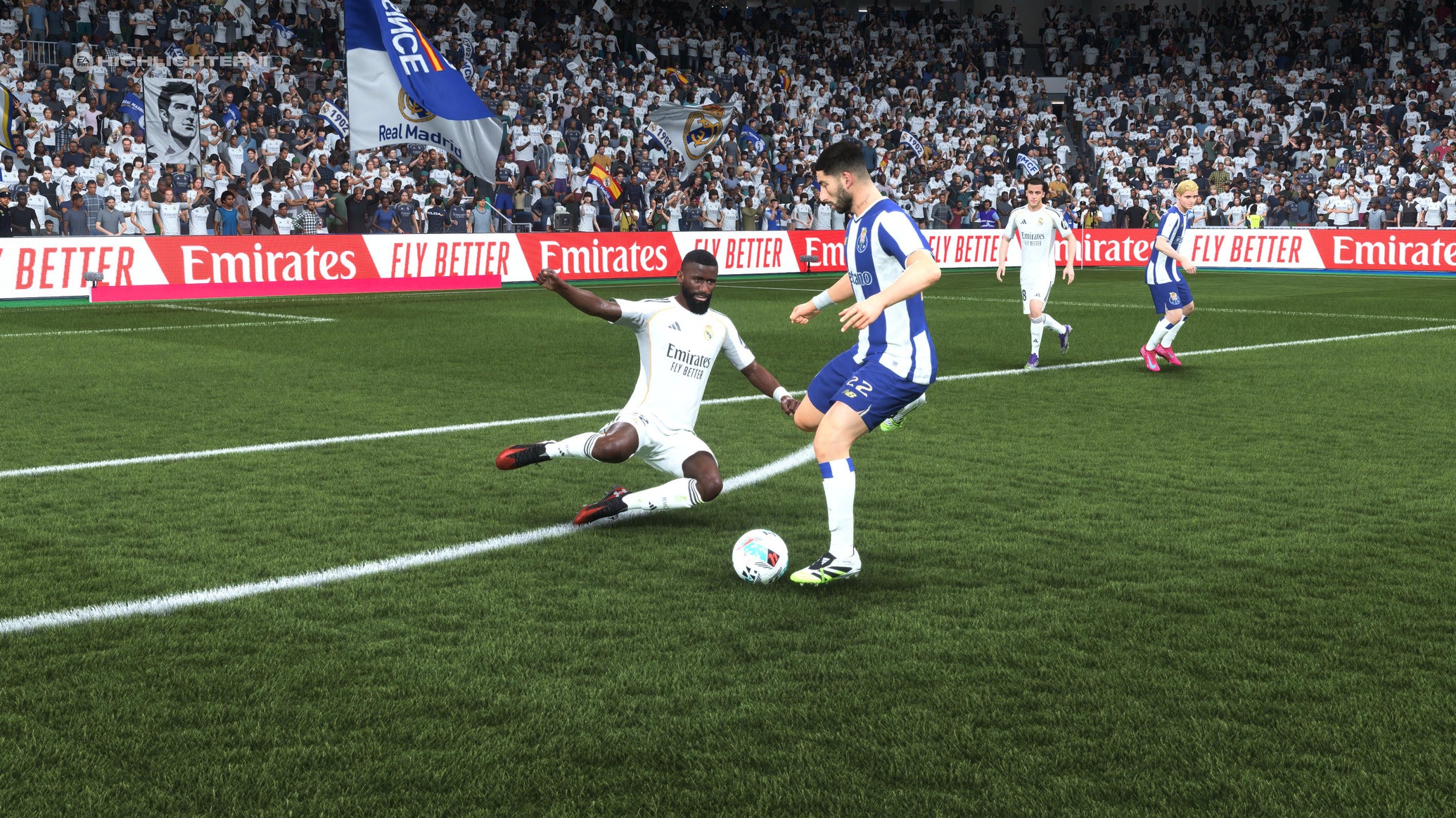 Antonio Rudiger sliding in to make a tackle in EA Sports FC 26. - 1