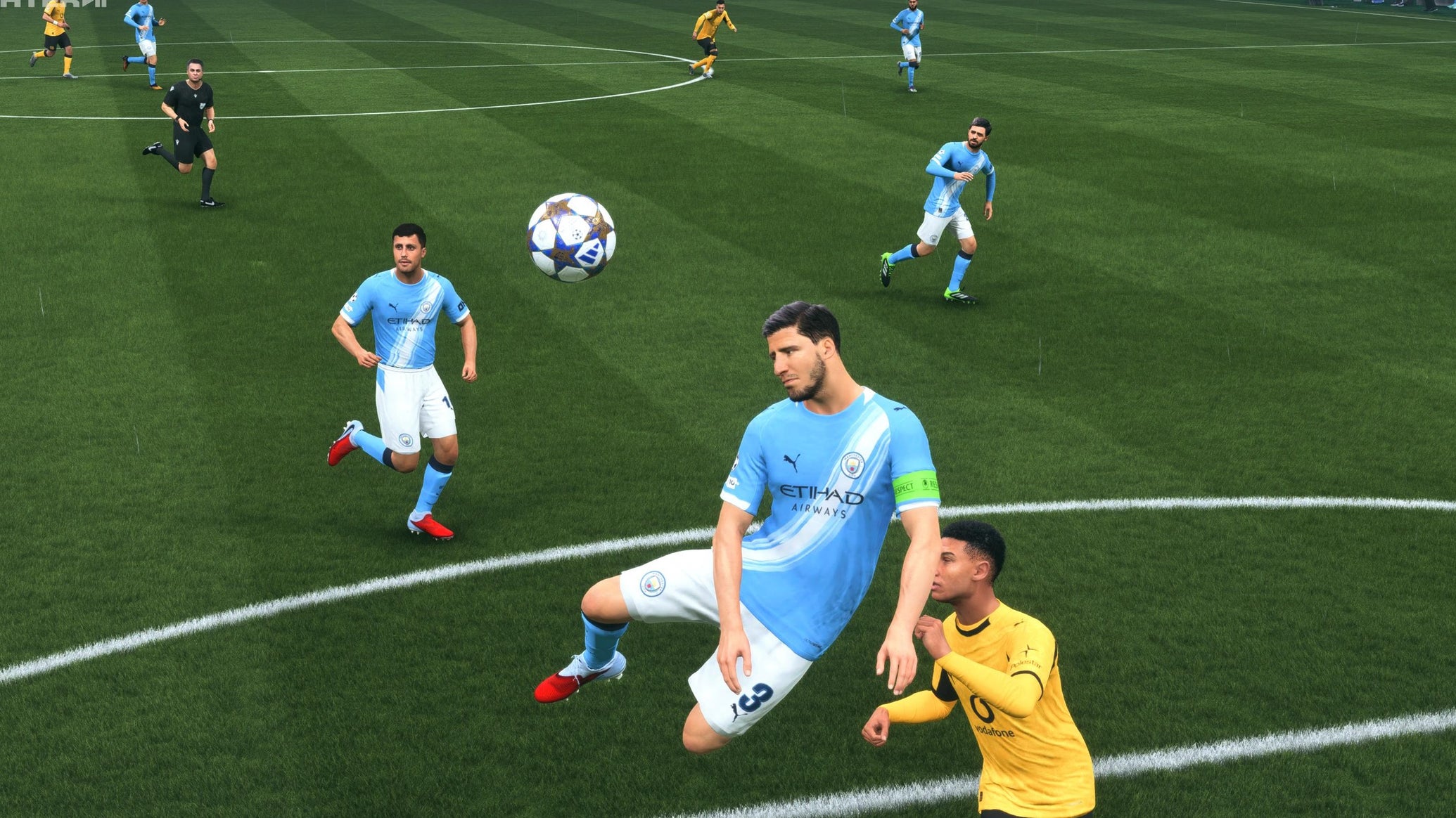Ruben Dias jumping to clear the ball in EA Sports FC 26. - 1