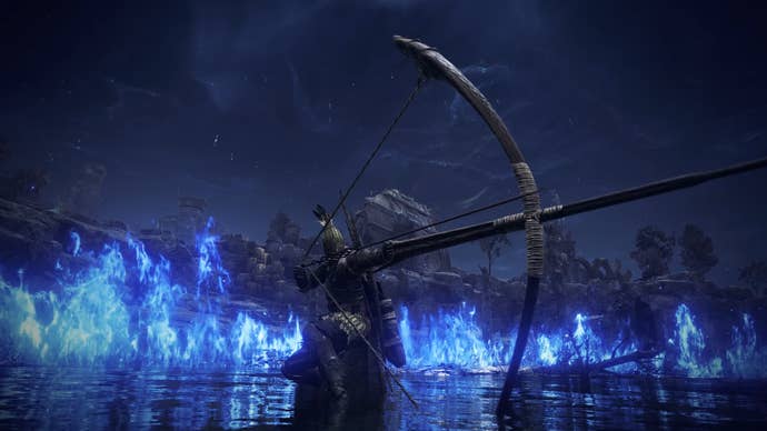Screenshot of Ironeye from Elden Ring Nightreign, kneeling and charging a bow attack surrounded by blue flame