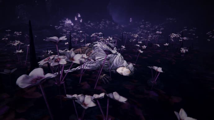 Strange masked figure lying on the ground amid purple water and white flowers