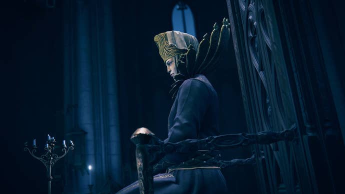 Grand looking figure with huge collar and headdress sits atop a throne in moonlight