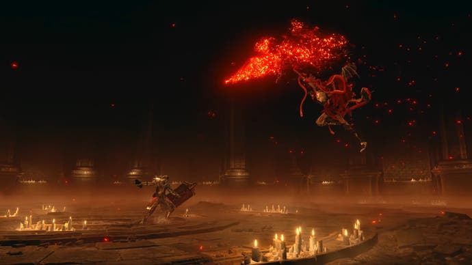Distant shot of player holding shield and Messmer leaping in air with flaming weapon