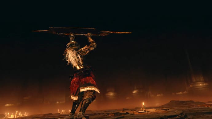 Player character holds aloft a large spiked shield