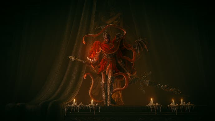 Miquella cloaked in red rises on a candelit altar in Shadow of the Erdtree