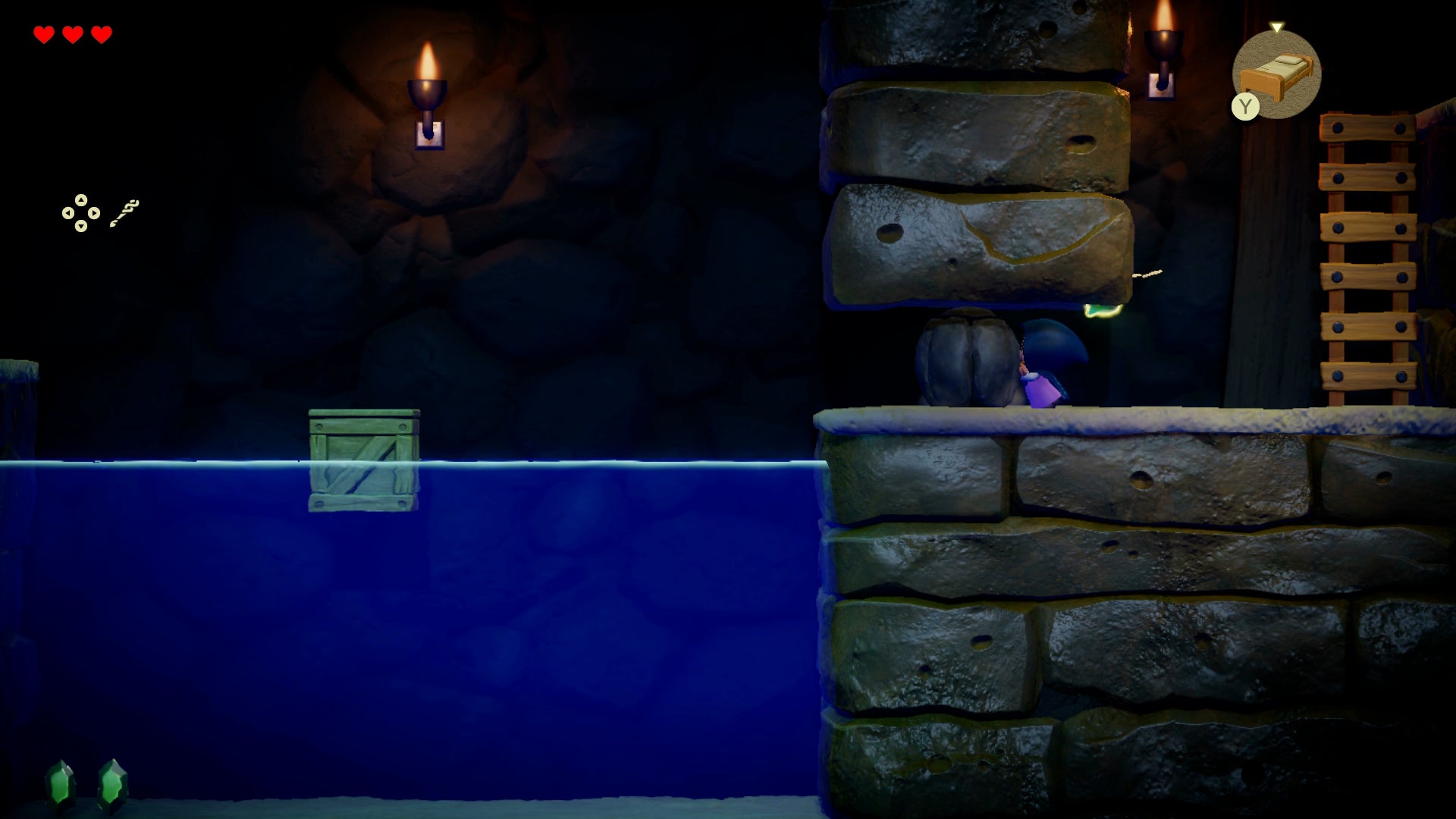 Zelda pushing a boulder in a tunnel beneath Hyrule Castle in Zelda: Echoes of Wisdom. - 9