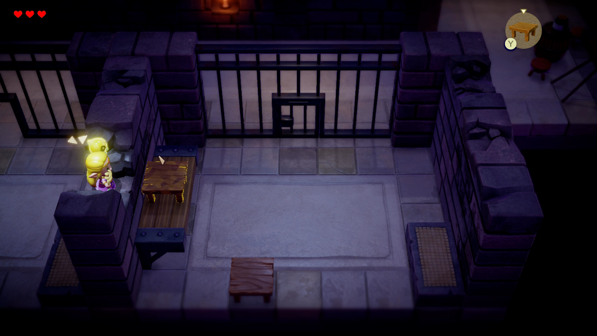 Princess Zelda sneaking out of her jail cell in Hyrule Castle in Zelda: Echoes of Wisdom. - 1