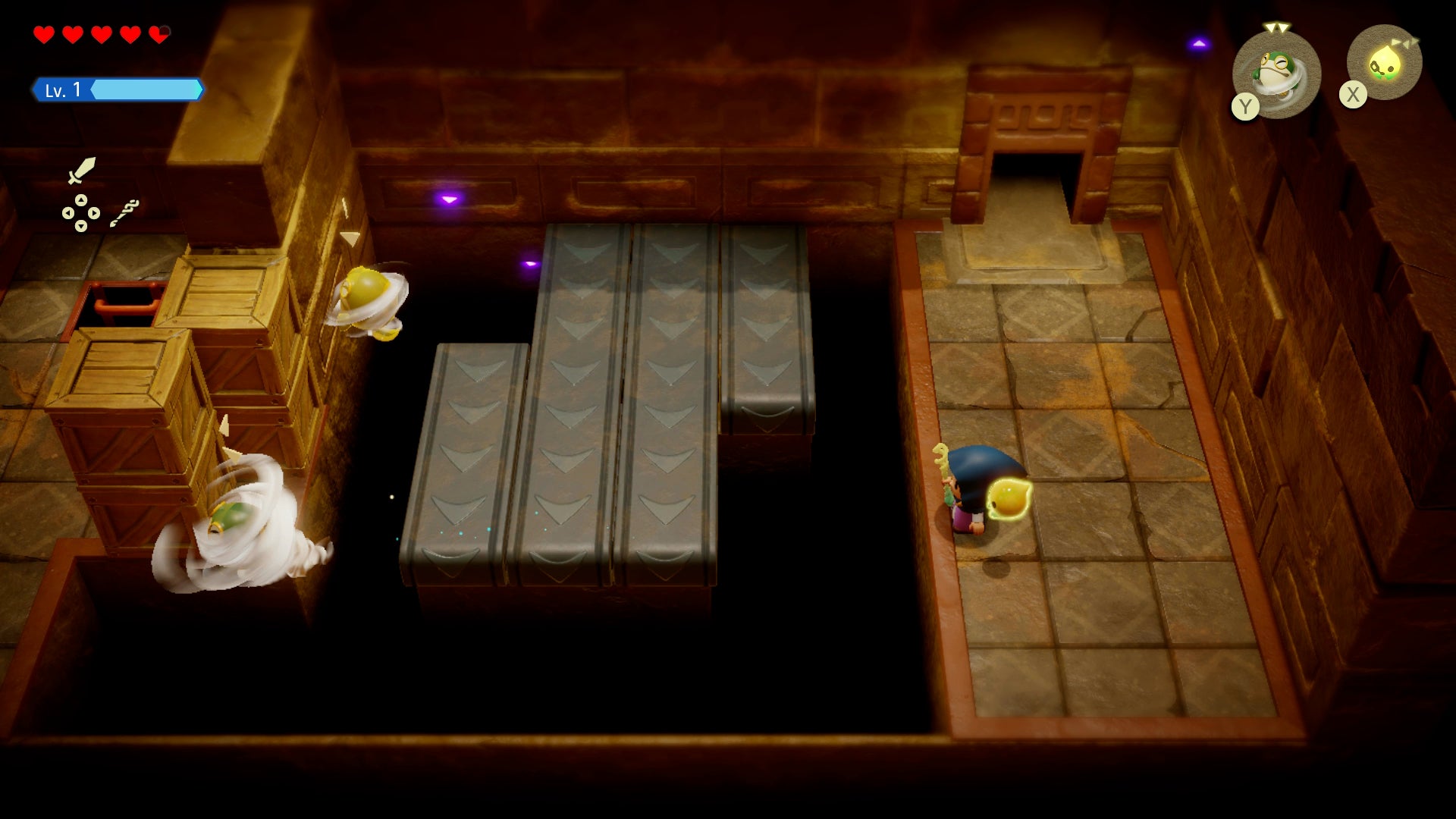 Princess Zelda blowing a gust of wind to move a wooden box in the Gerudo Sanctum in Zelda: Echoes of Wisdom. - 14
